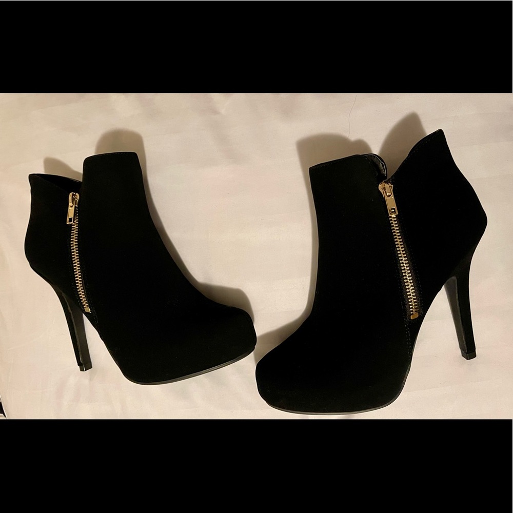 Beautiful new black high heel booties